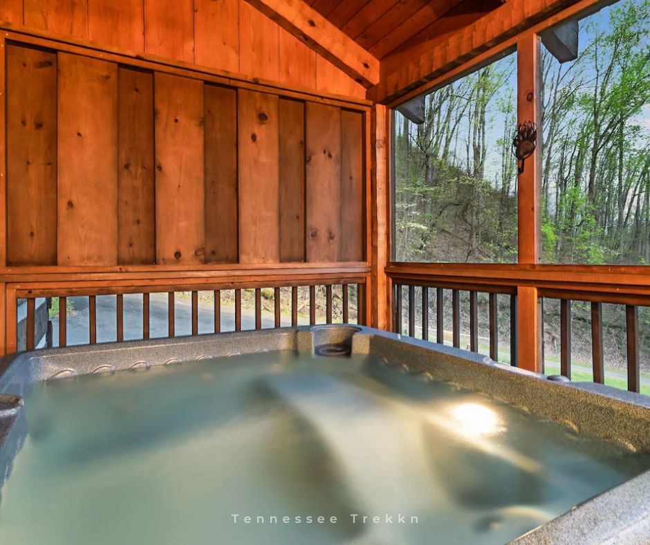 Private Custom Cabin: Soak in the HOT TUB while enjoying breathtaking mountain views. Pigeon Forge Cabin Rentals.