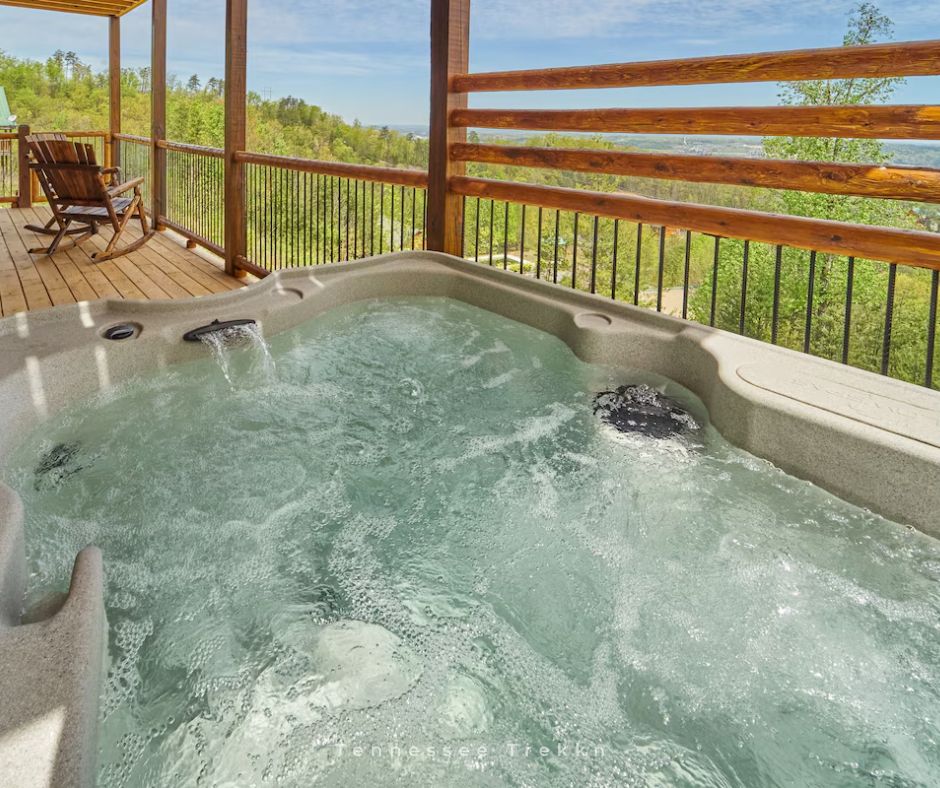 Beyond Views Cabin: After a long day, relax in the HOT TUB with stunning views all around.