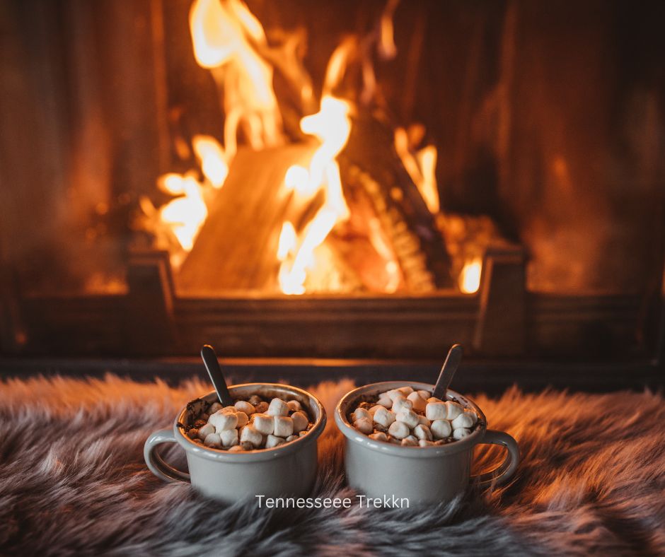 Fireplace with cozy cocoa mugs in front. Perfect for celebrating Valentines Day in Gatlinburg.