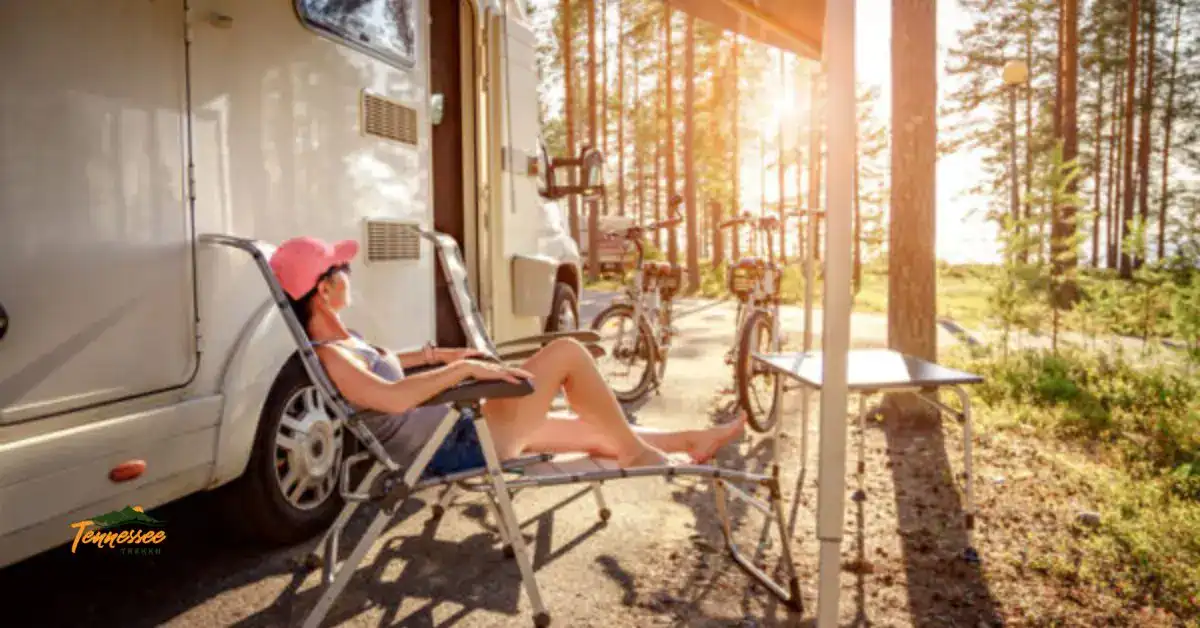 Woman relaxing at a campsite in one of Pigeon Forge's best campgrounds.