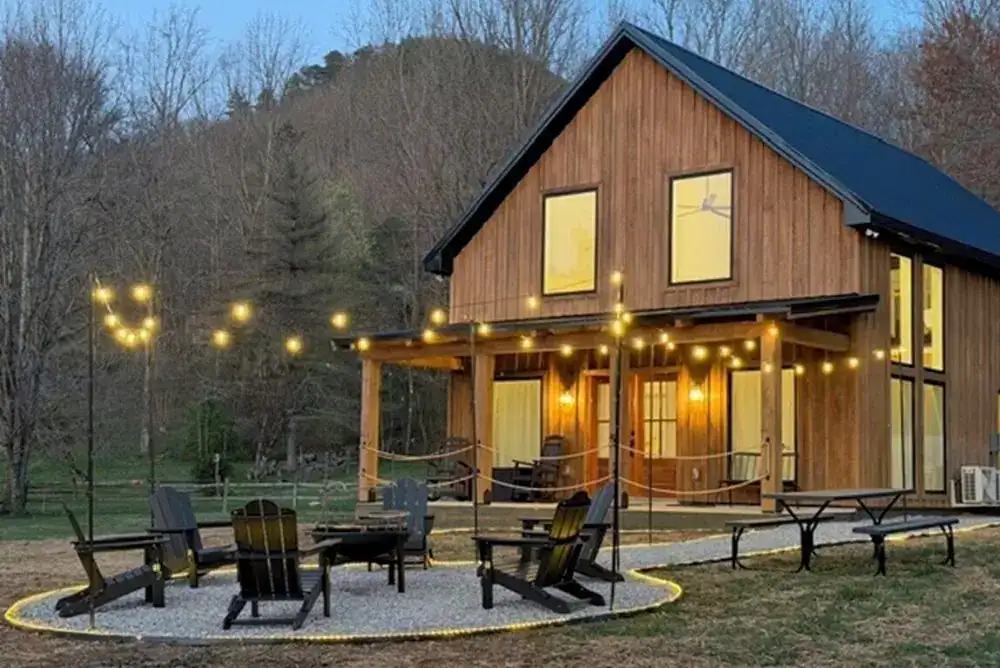 Exterior of mountain cabin with firepit area in the Smokies. 
