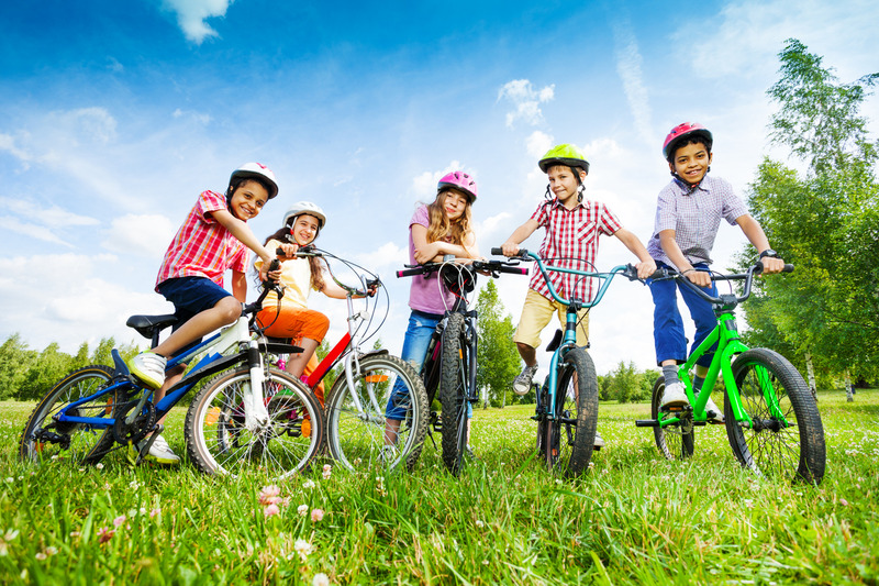 Group of kids on bicycles. Riding bikes camping in Smoky Mountains, Tennessee