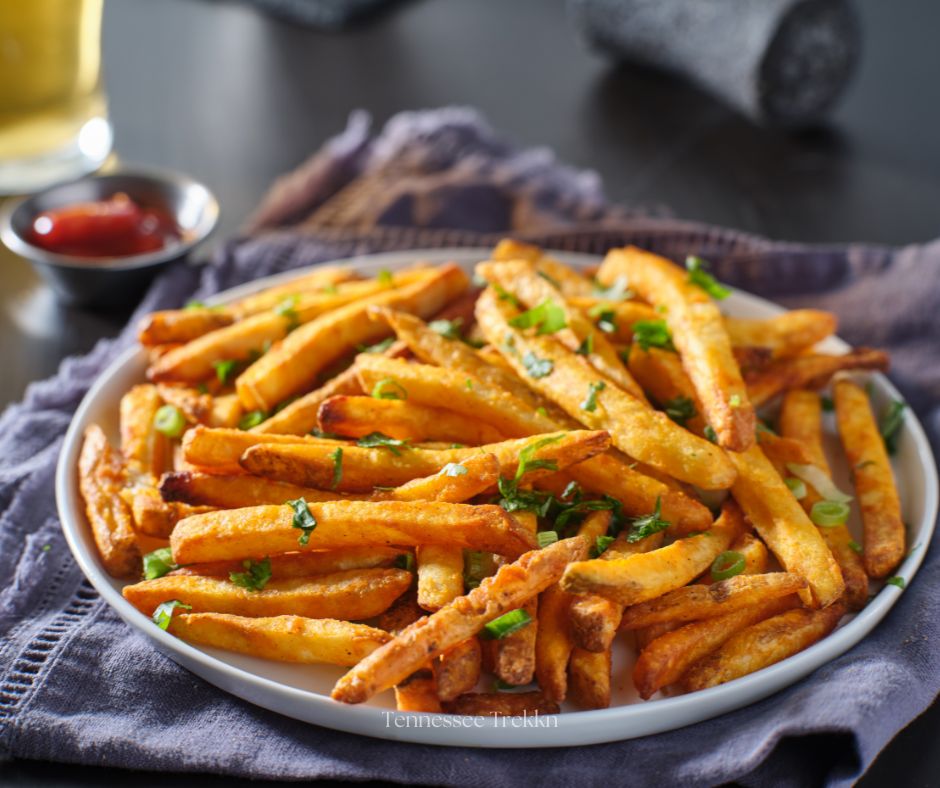 Crispy, cheesy, and full of flavor—these Parmesan fries from Company Distilling are a must-try!