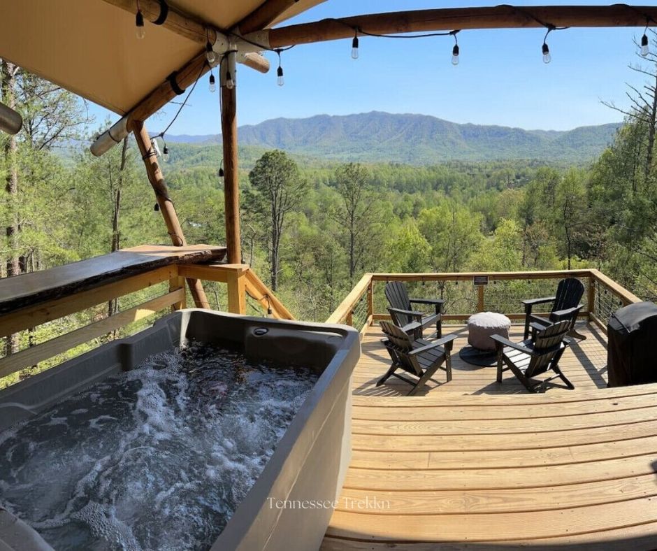 Relax in the hot tub while soaking in these amazing mountain views. Book your stay HERE.