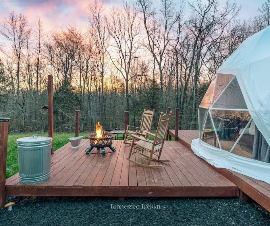 Relax by the fire in comfy rocking chairs, soaking in the peaceful surroundings. Tennessee Glamping. Book your stay HERE!