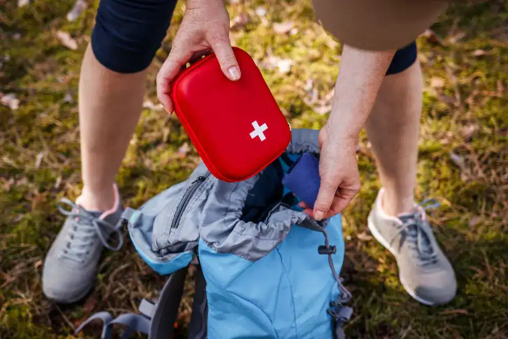 First aid kit ready for the trail — a top tip for hiking with kids.