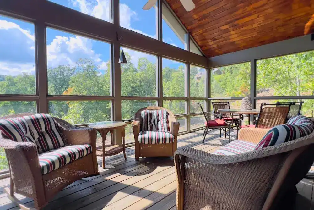 Screened porch at a large group cabin in Gatlinburg TN with Smoky Mountain views