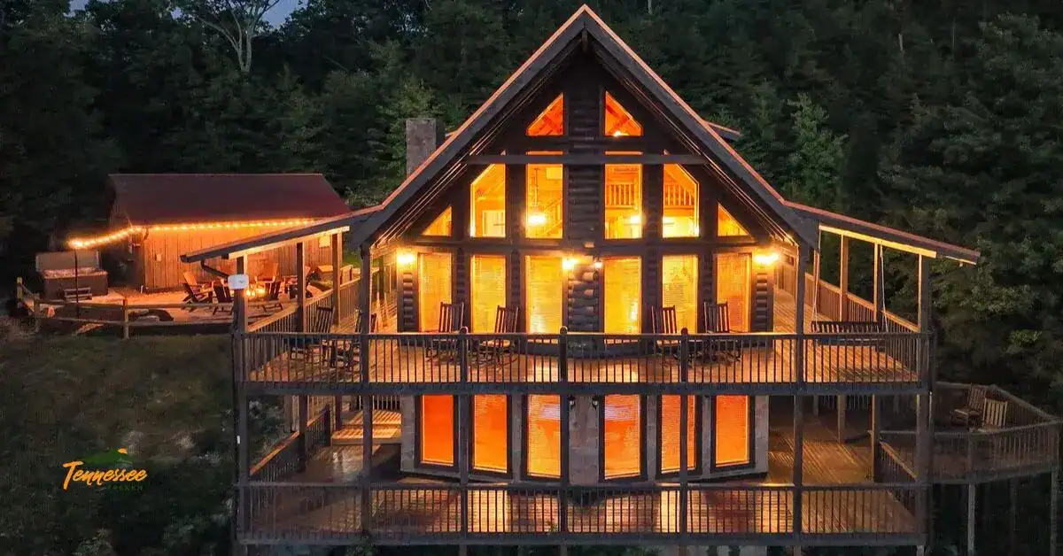 Beautiful Smoky Mountain cabin for large groups lit up at night