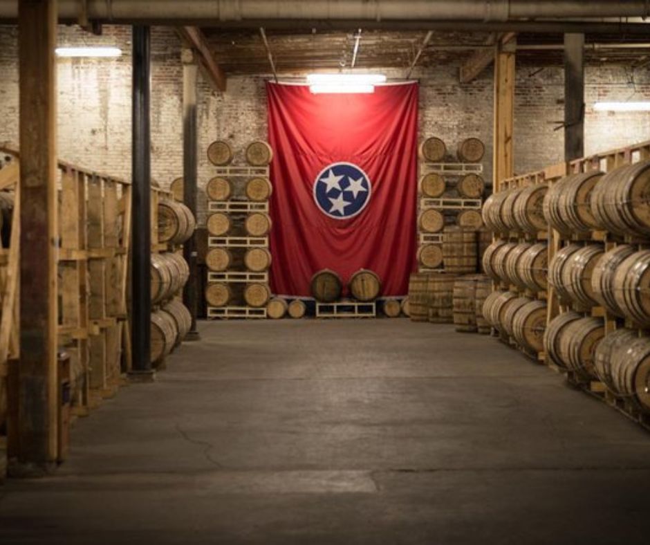 Whiskey Barrel storage room with Tennessee Flag. (red flag, blue circle in middle with 3 white stars)