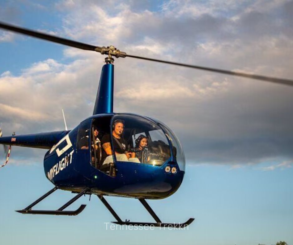 This family is soaring high on a fun Smoky Mountain adventure! Helicopter rides in Pigeon Forge.