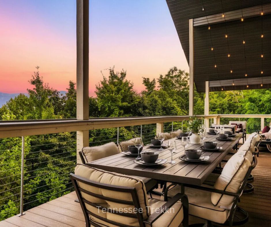 Outdoor dining area at Garrett Lodge with seating and scenic mountain views.