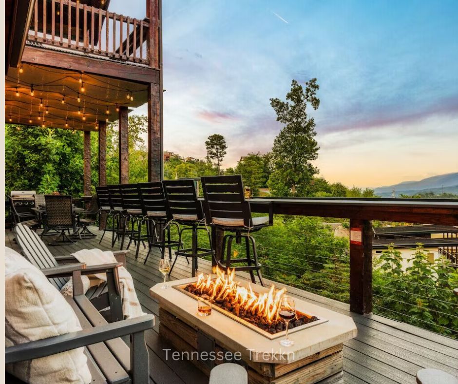 Relax by the fire pit with Smoky Mountain views all around. Book HERE for unforgettable evenings in the mountains.