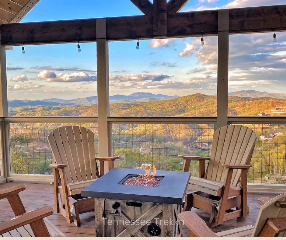 Outdoor seating area at Heaven’s Perch with firepit, chairs, and views of the Smoky Mountains. Chalet Village Gatlinburg Cabin.