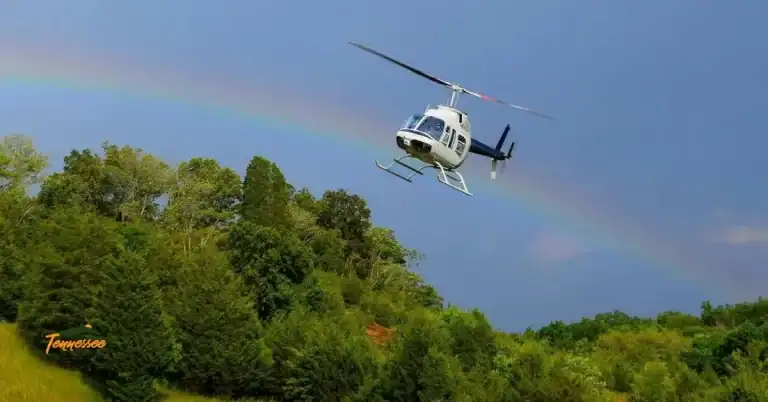 Helicopter flying above the mountains, representing helicopter rides in the Smokies and scenic aerial tours in East Tennessee.