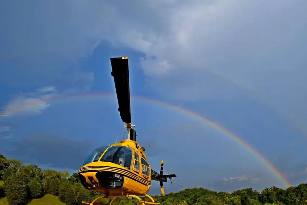 Douglas Lake tour with rainbow in the background

