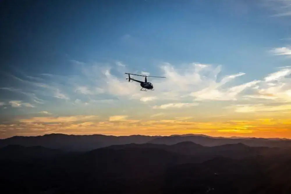  Sunset over the Smoky Mountains with fall foliage below

