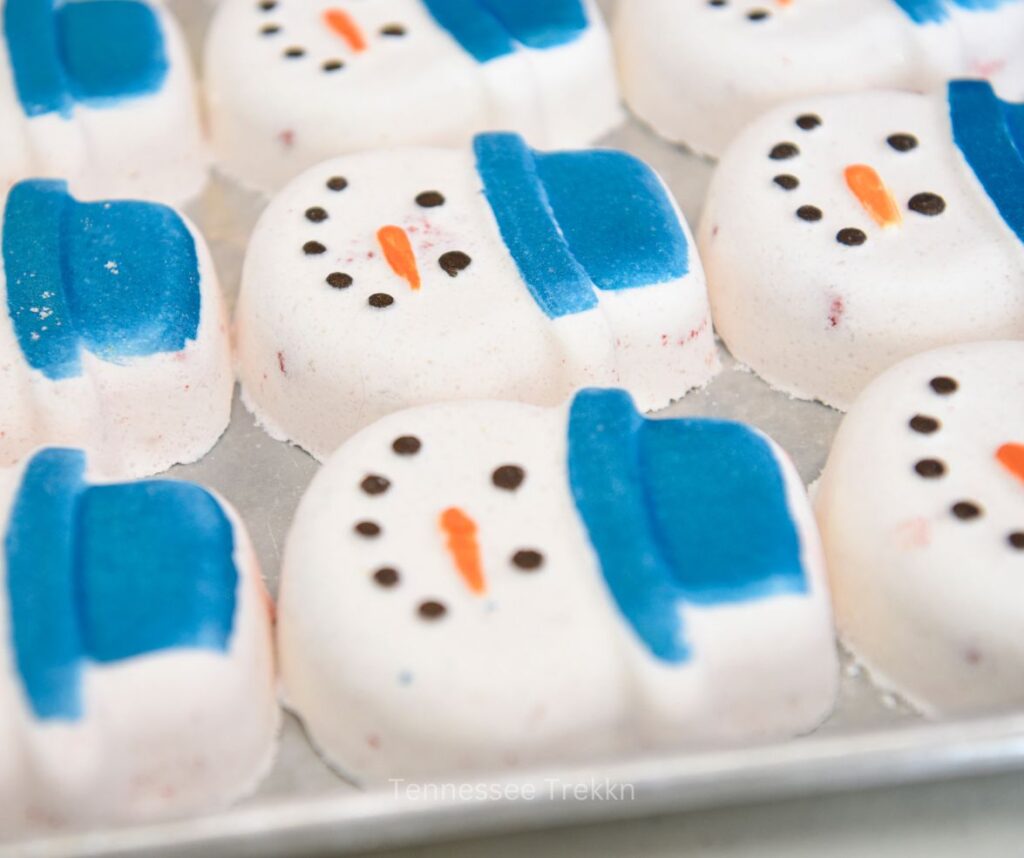 Snowman bath bombs handmade by The Bath Lab, adding a playful touch to bath time.