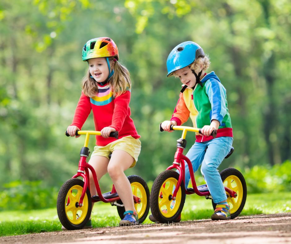 Kids riding bikes outside, showcasing outdoor gifts for kids that encourage active play and exploration.