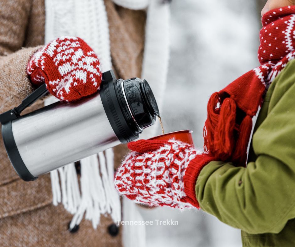 Pouring a hot drink from a thermos during the winter months, a thoughtful gift idea for outdoor enthusiasts.