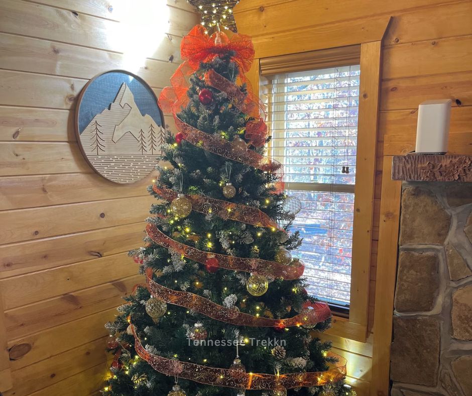 A beautifully decorated tree inside Sugar Shack, creating a cozy and festive holiday atmosphere in the Smokies.