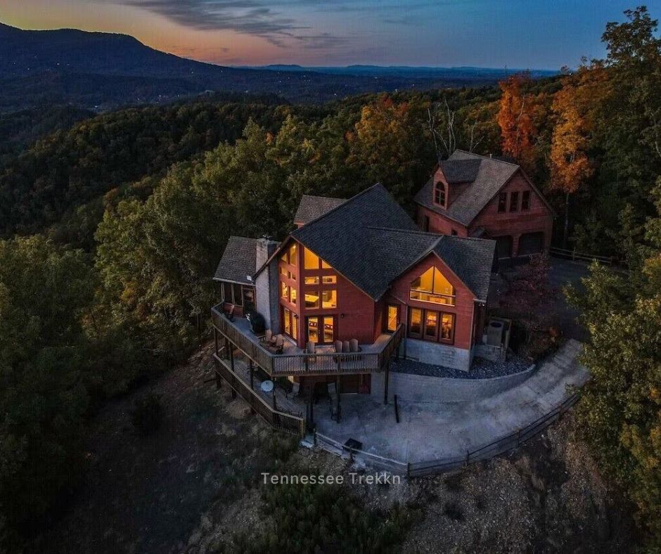  A stunning cabin nestled in the Smoky Mountains, surrounded by trees and festive holiday charm. Christmas Cabins in the Smokies. 