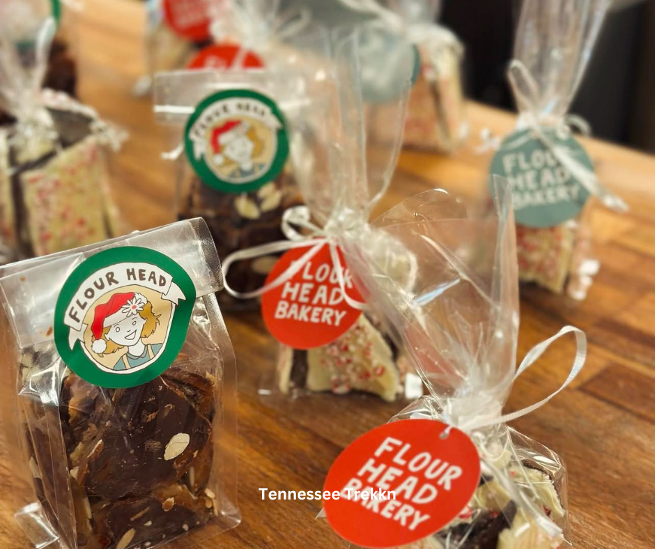 Christmas cookies from Flour Head Bakery in Knoxville, decorated with icing and sprinkles, perfect for a holiday treat.