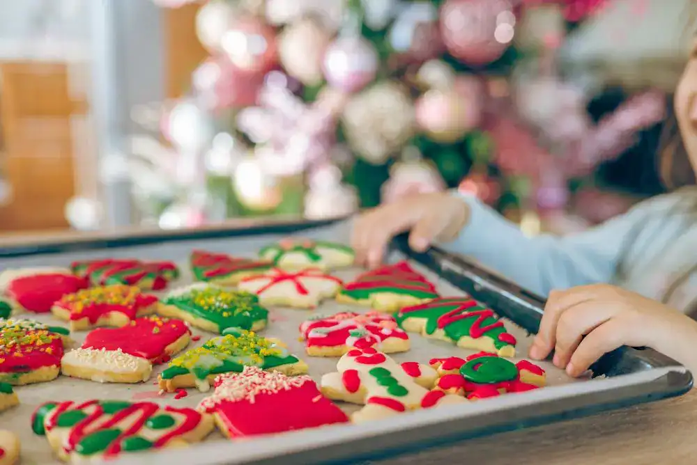 Baking pan full of decorated Christmas cookies. 