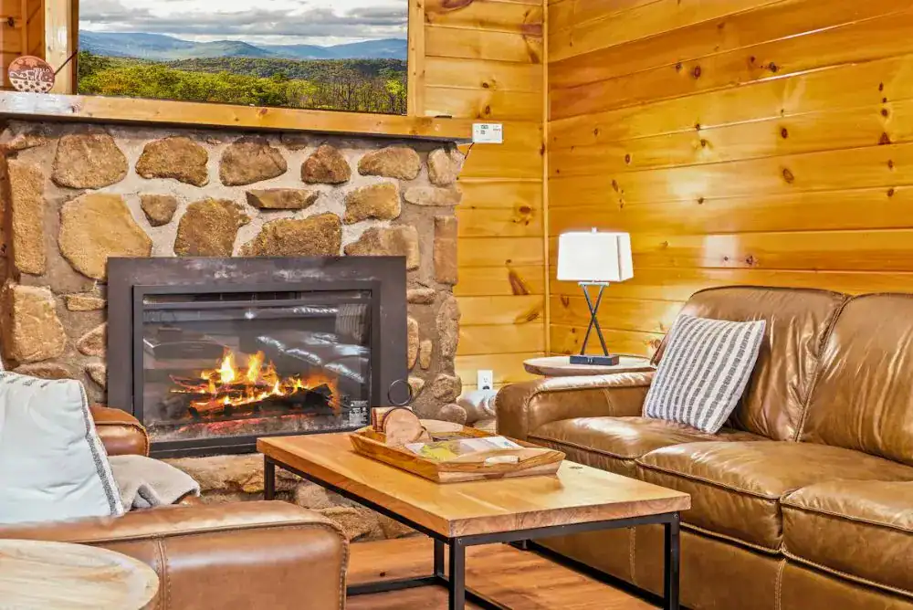 Cabin in the Smoky Mountains with cozy fireplace. 
