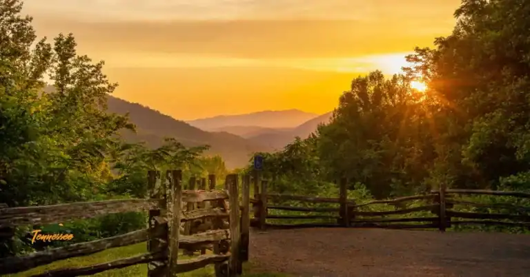 Sunrise over a scenic landscape in Tennessee State Parks, symbolizing outdoor adventure, hiking, and camping opportunities across the state.