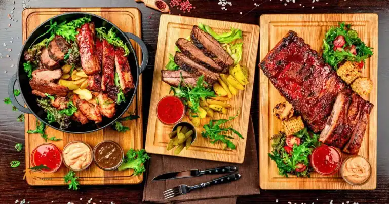 Plate of Memphis-style barbecue with ribs, pulled pork, and classic Southern sides — perfect visual for a guide to the best BBQ spots in Memphis, TN.