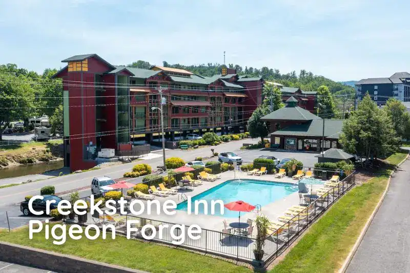 Creekstone Inn pool area with view of the property — one of the scenic Pigeon Forge hotels under $100.

