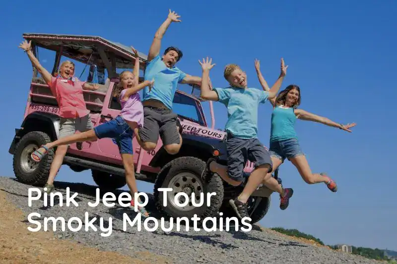 Family jumping in the air beside a Pink Jeep with mountain views, celebrating family fun in Pigeon Forge.