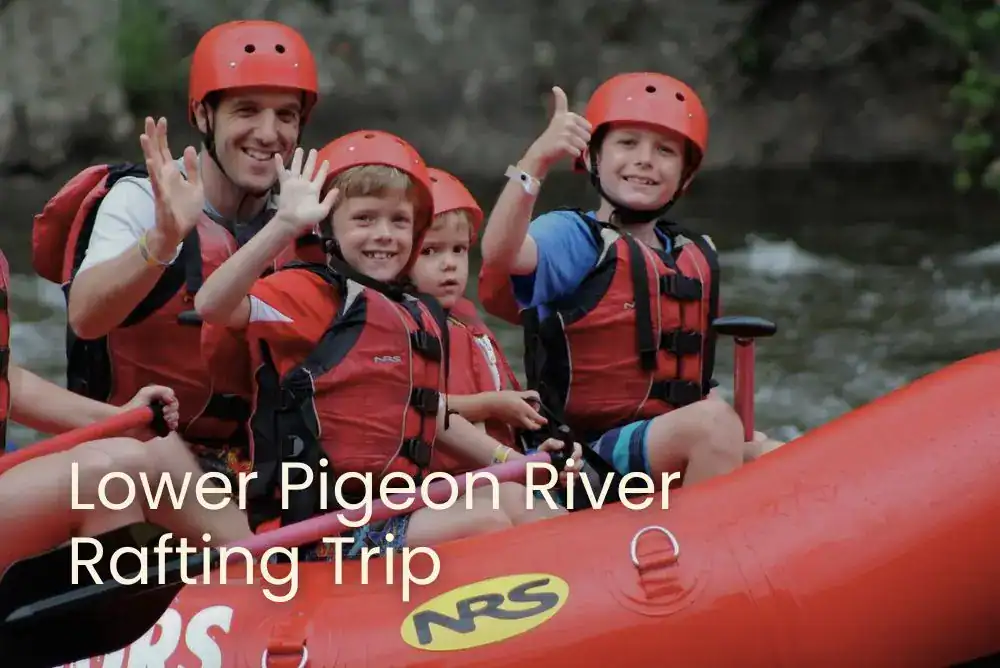 Smiling family giving a thumbs up while rafting in the Smokies on a fun Lower Pigeon River adventure

