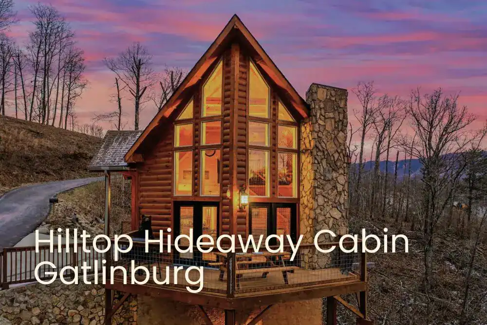 Gatlinburg Smoky Mountain cabins perched on a scenic hilltop, offering peaceful surroundings and incredible mountain views