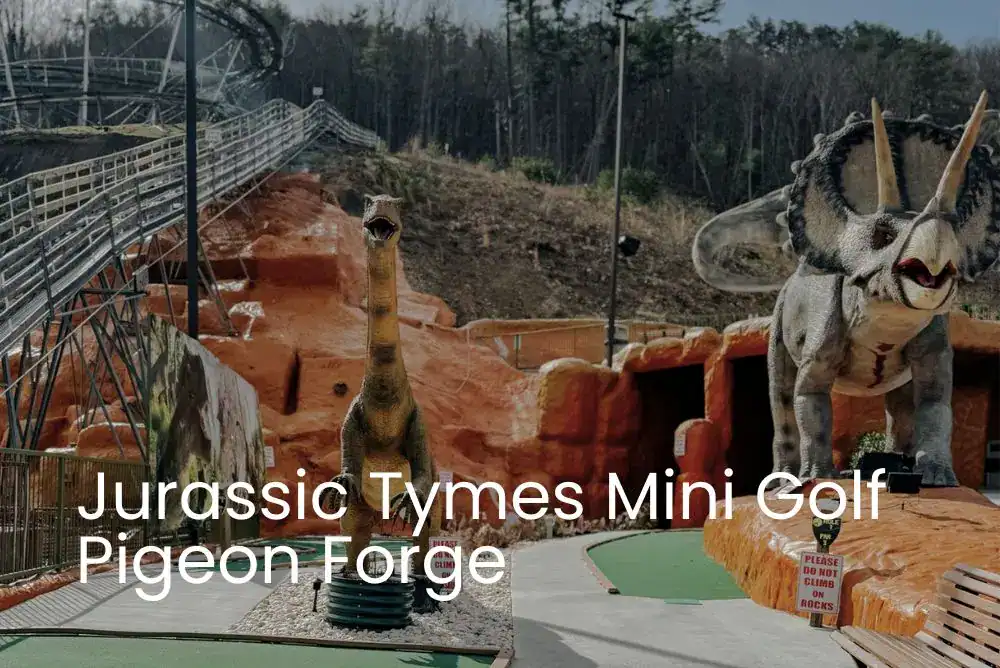 Dinosaur statues on the Jurassic Tymes Mini Golf course in Pigeon Forge, a fun prehistoric-themed mini golf experience for families

