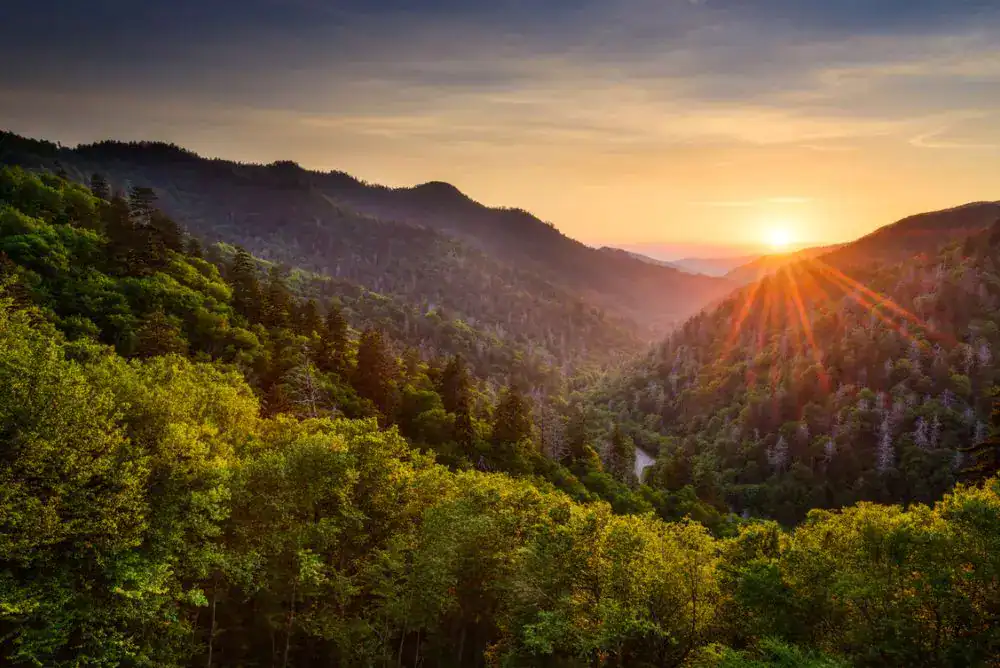 Sunset over the Smoky Mountains, showcasing the natural beauty near Dancing Bear Lodge, Townsend, TN