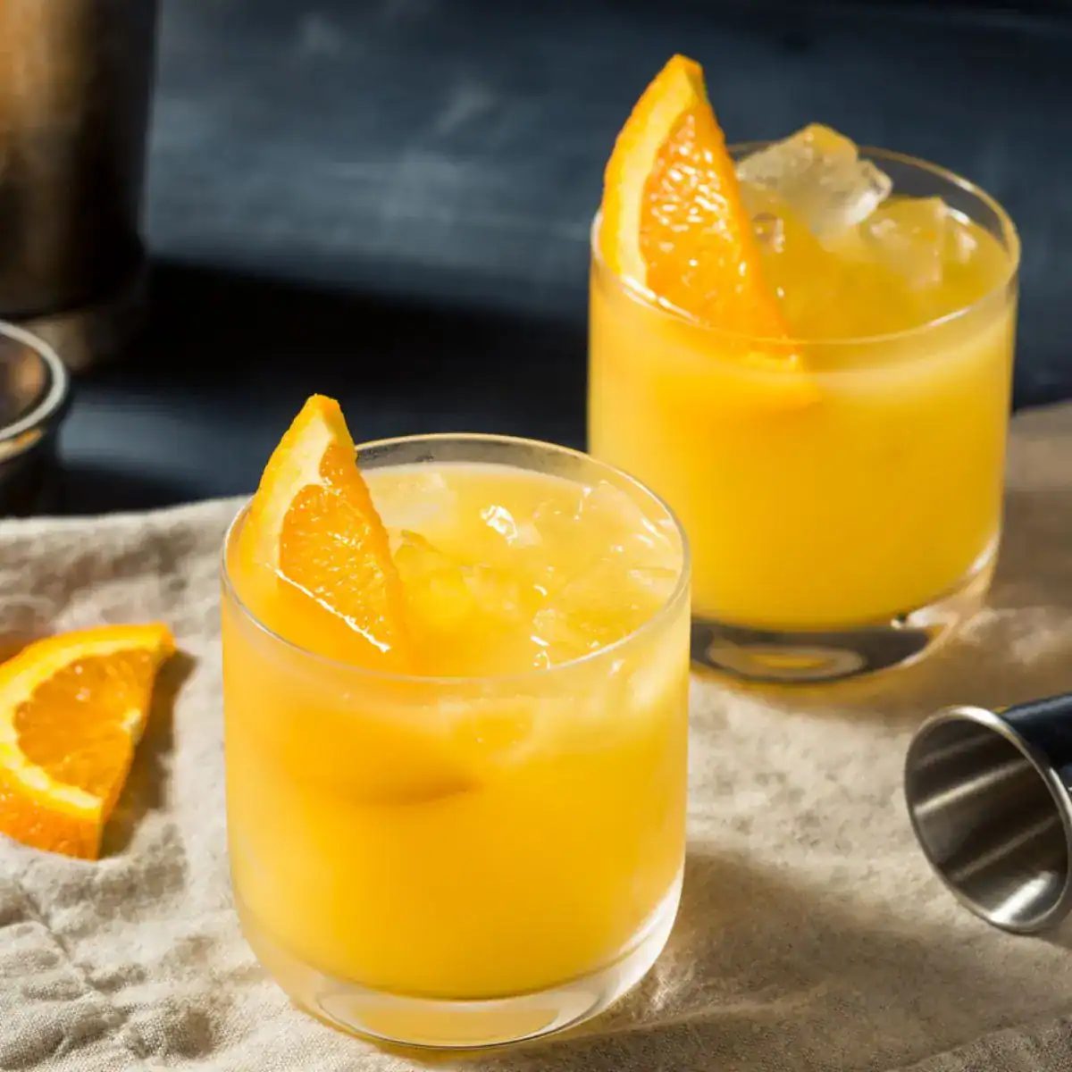 Big Orange Buzz, a bold moonshine cocktail and Tennessee Vols game day drink, served with an orange garnish for Tennessee football fans.