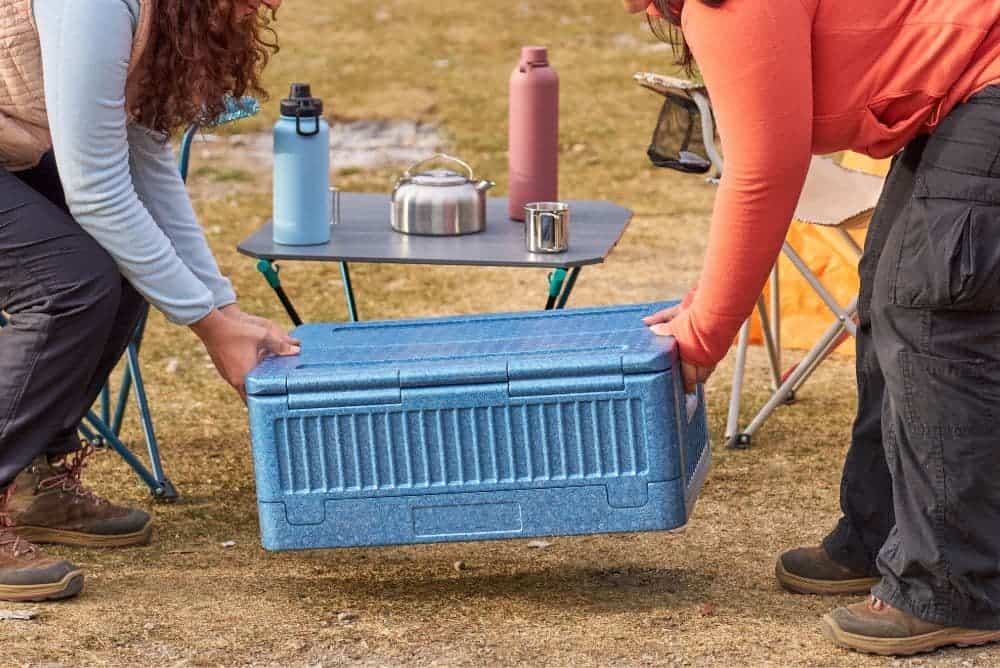 Camping cooler as part of must-have camp kitchen essentials for any trip