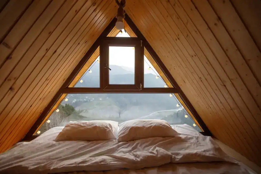Waking up to mountain views from bed in a cozy A-frame Townsend cabin