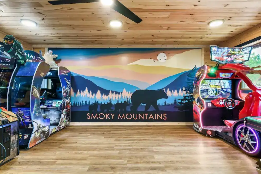 game room with arcade games and foosball, 