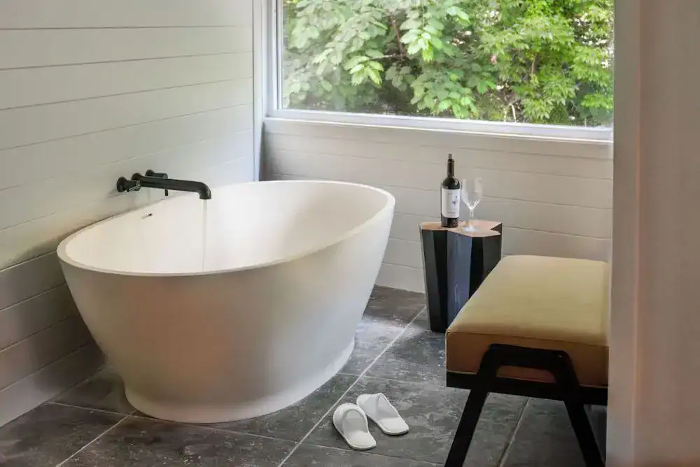 Luxury bathtub inside Rocky Waters Inn, featuring a clean modern design at one of Gatlinburg’s historic hotels.