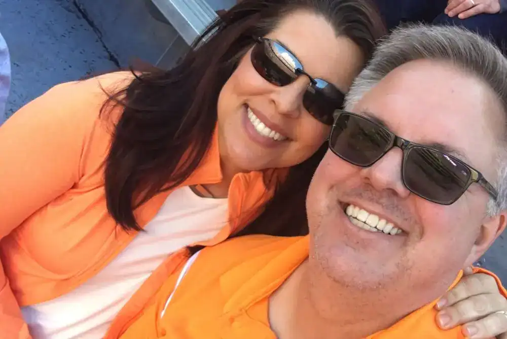 Angela and her husband enjoying Tennessee football at Neyland Stadium, celebrating game day as proud Tennessee Vols fans.