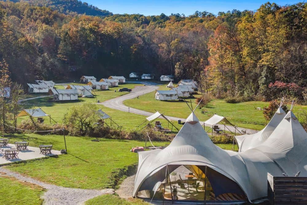 Luxury yurts at Under Canvas Sevierville surrounded by trees and mountain views in the Great Smoky Mountains.