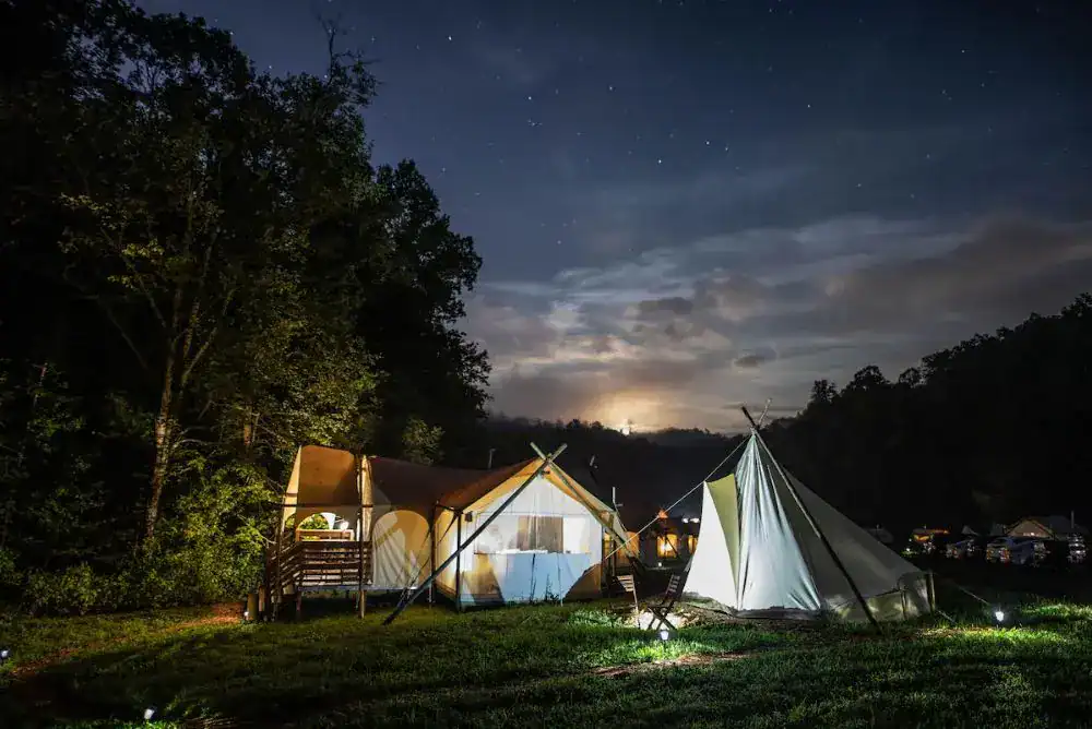 Outside view of the family tent area at Under Canvas in the Smoky Mountains with kids’ tent next to the main tent