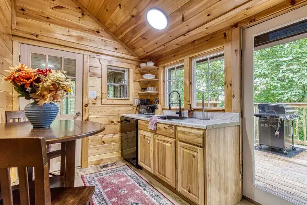 Lover's Hideaway kitchen area at a romantic fall Smoky Mountain getaway cabin. 