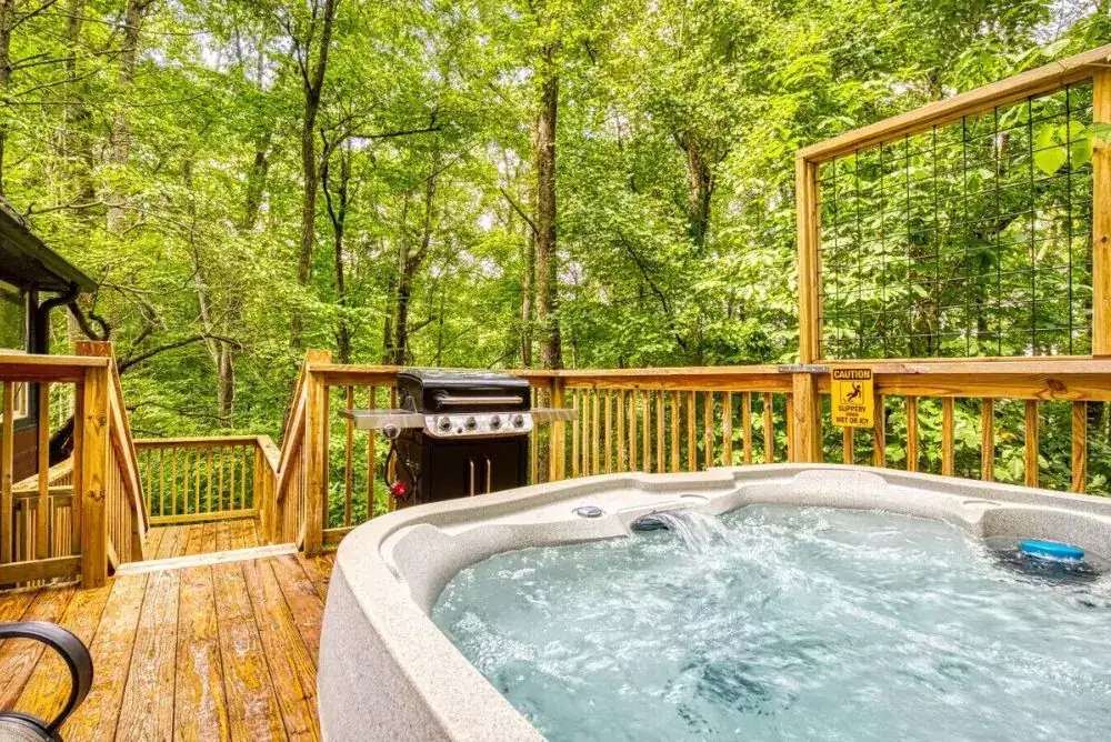 Outdoor hottub at fall cabin rental in the Smokies. 