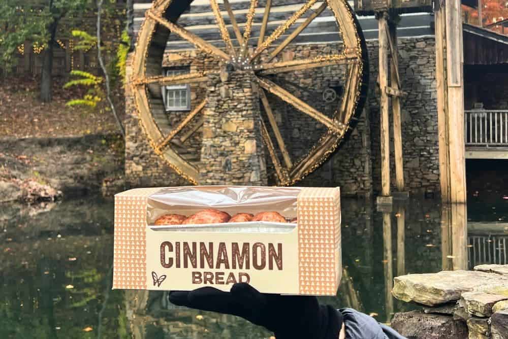 Warm cinnamon bread from The Grist Mill at Dollywood during Smoky Mountain Christmas - grab your tickets and grab some bread!