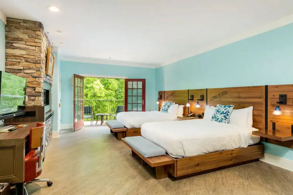 Guest room with private balcony at Margaritaville Island Hotel in Pigeon Forge TN.