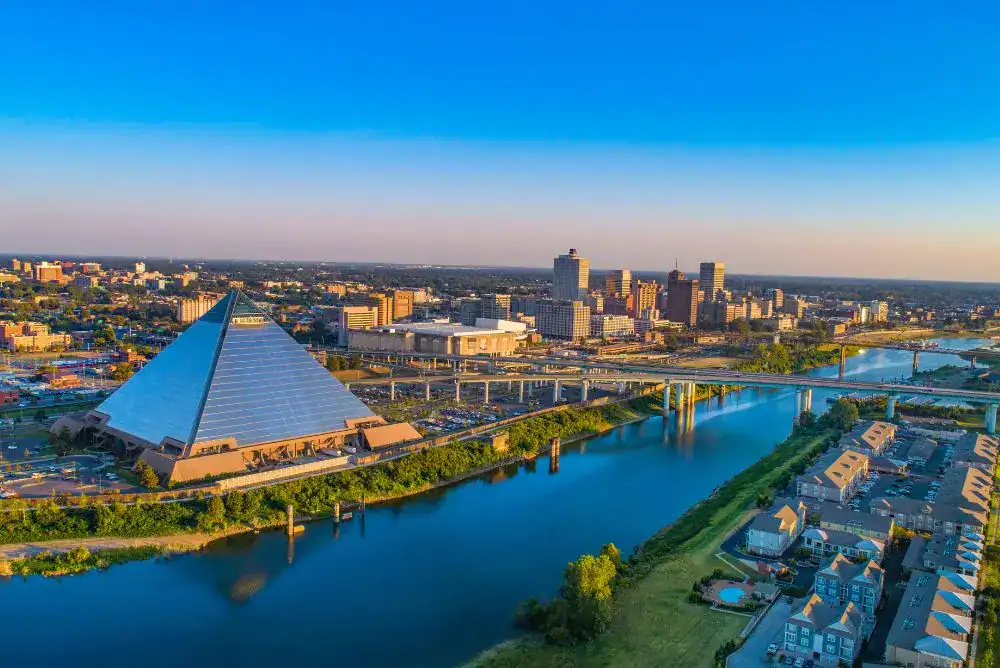 Tennessee travel guide image showing the Memphis skyline along the Mississippi River in West Tennessee.