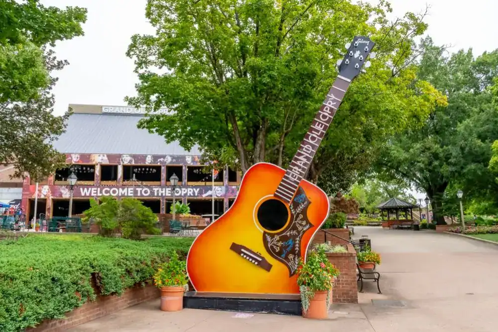 Grand Ole Opry in Nashville TN with iconic guitar statue and outdoor walkway - one of the areas top things to do